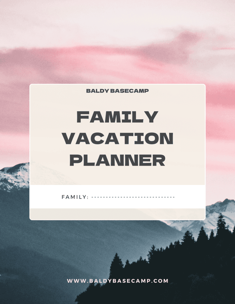 Family vacation planner by Baldy Basecamp Cover picture with a mountain range backdrop and pink skies in the background.