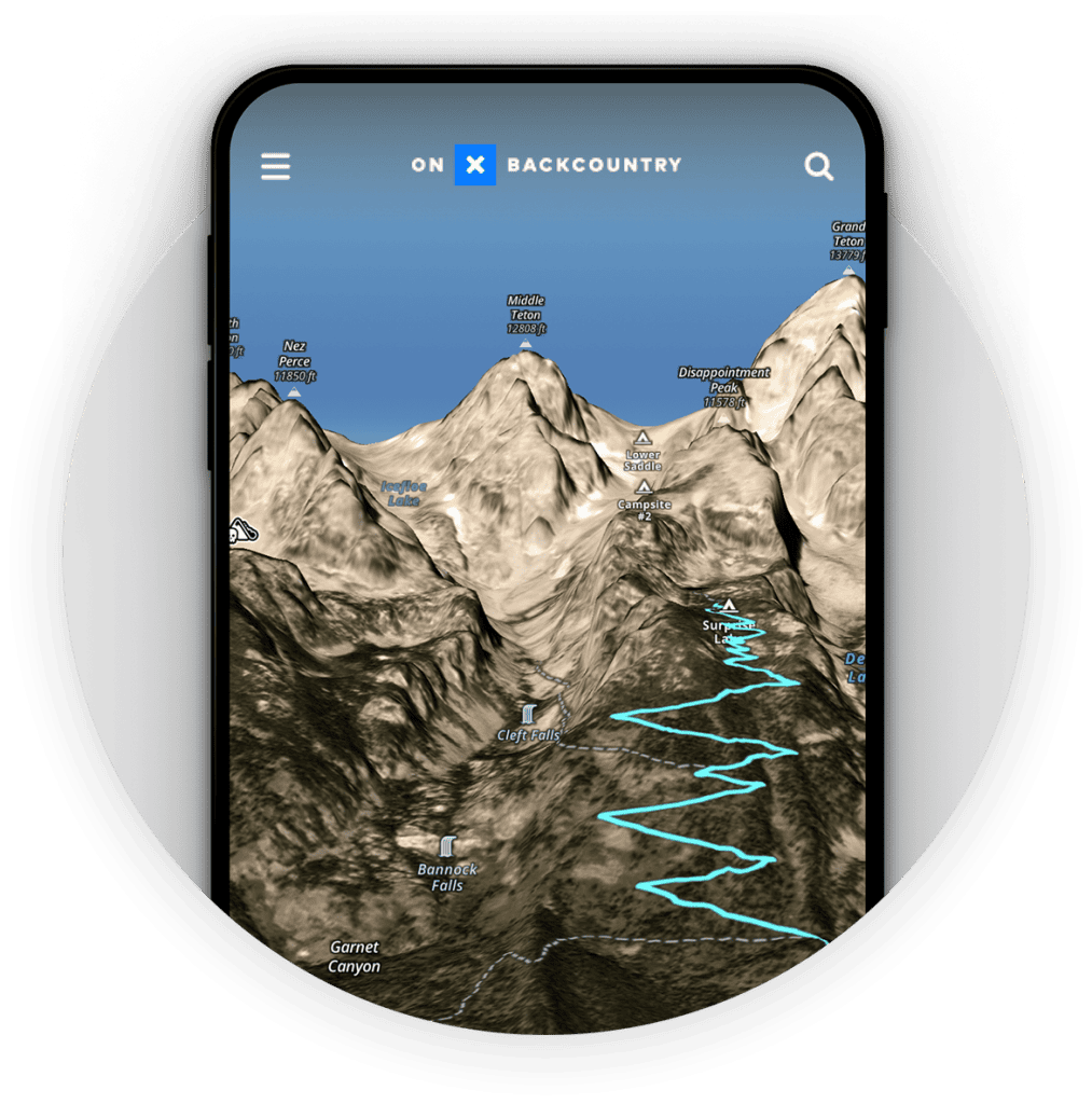 onX Backcountry app screen on iphone with mountains